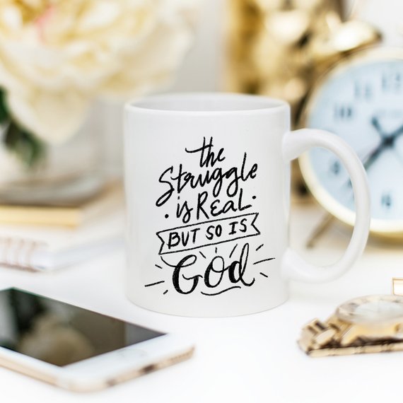 The Struggle Is Real But So Is God Mug by Magenta Shadow Coffee & Tea Cups